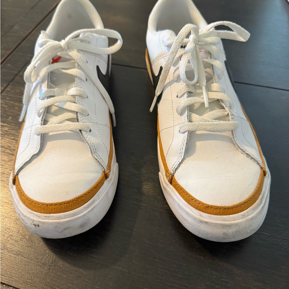 Nike White Low-Top Sneakers with Black Swoosh and Gold Accent - Picture 2 of 6